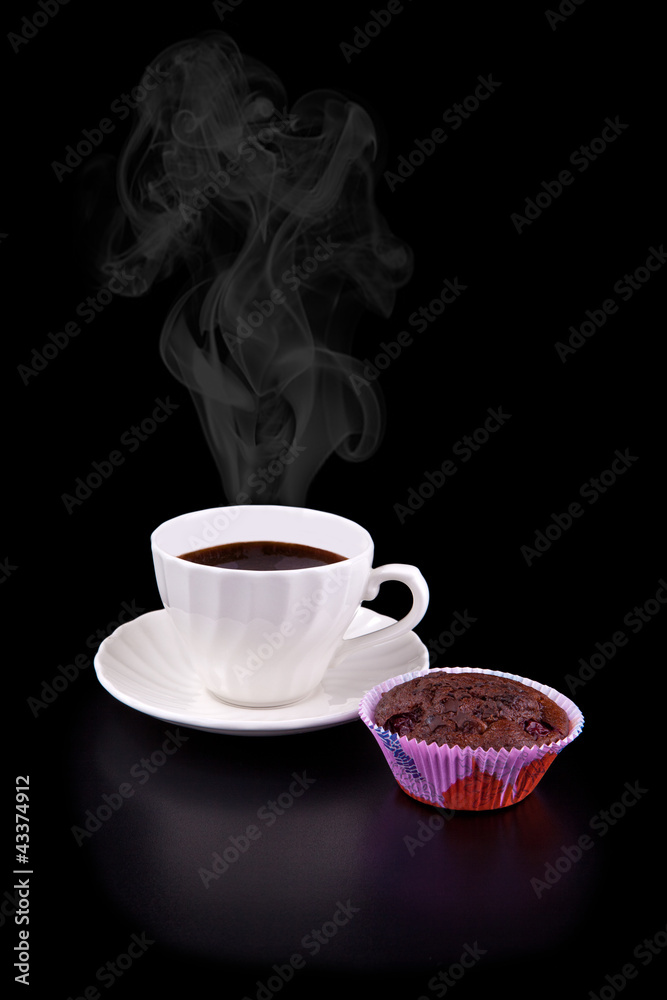 Hot cup of coffee and chocolate cherry muffin Hot cup of coffee and chocolate cherry muffin