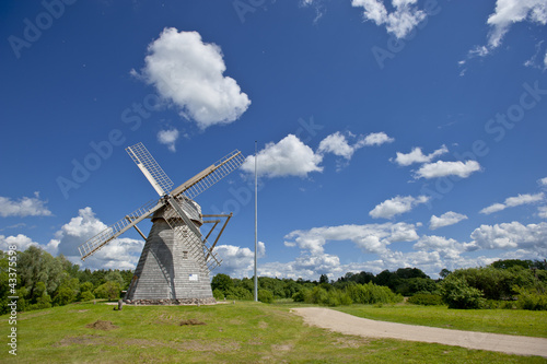 Old mill by the road photo