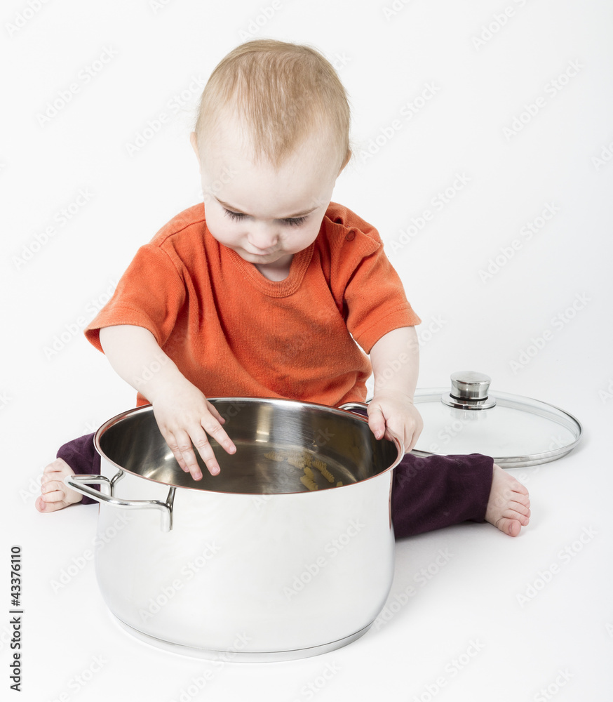 baby with big cooking pot