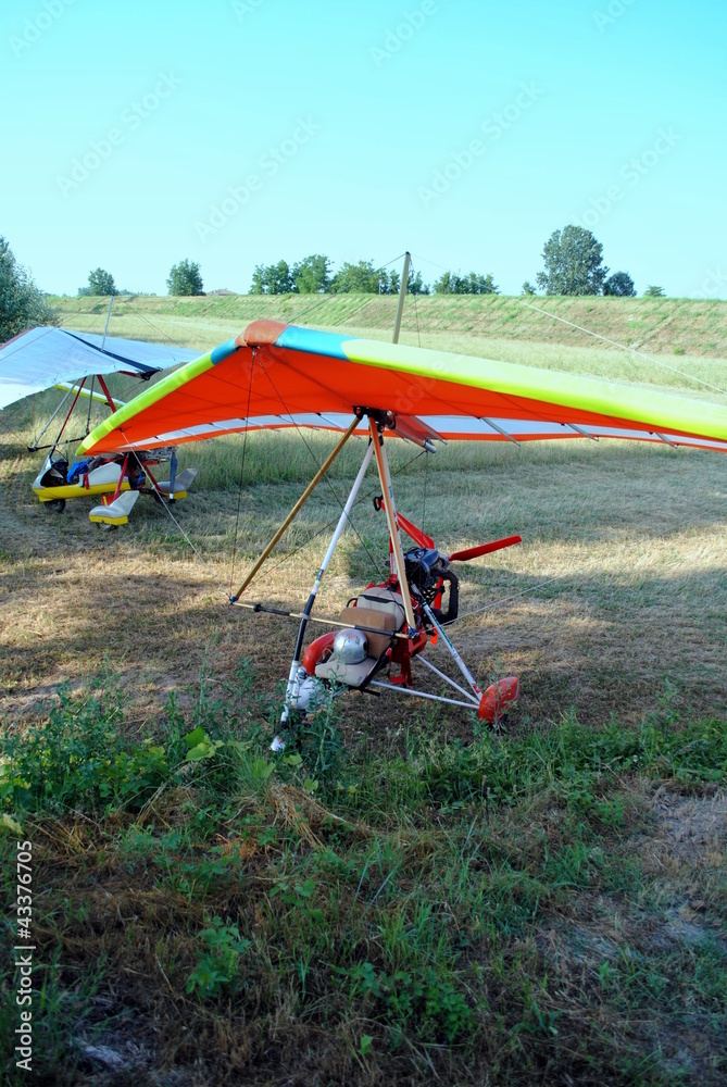colorful hang gliders ready for the take off