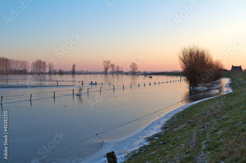 River IJssel at high water, sunrise photo