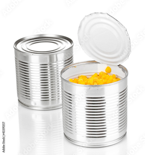 Open tin can of corn and closed can isolated on white