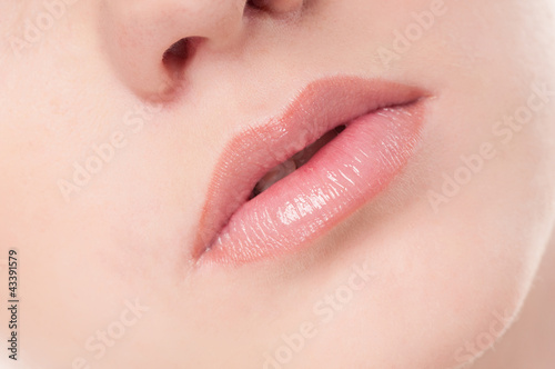 Face of beauty young woman. Lips zone