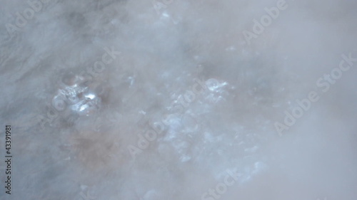 footage of boiling of hot water with prominant bubbles photo