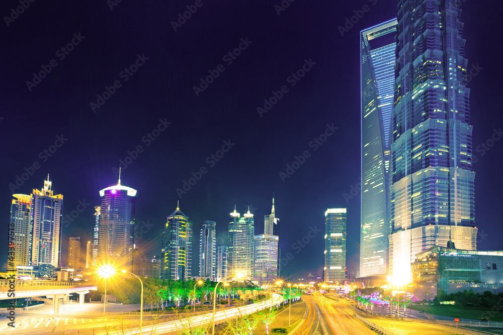 Fototapeta premium the light trails on the modern building background