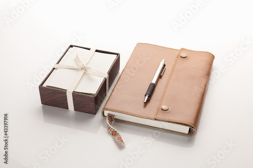 Leather notebook and box of cards