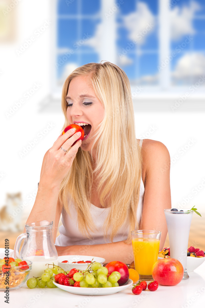 Attractive young woman having healthy breakfast Attractive young woman having healthy breakfast