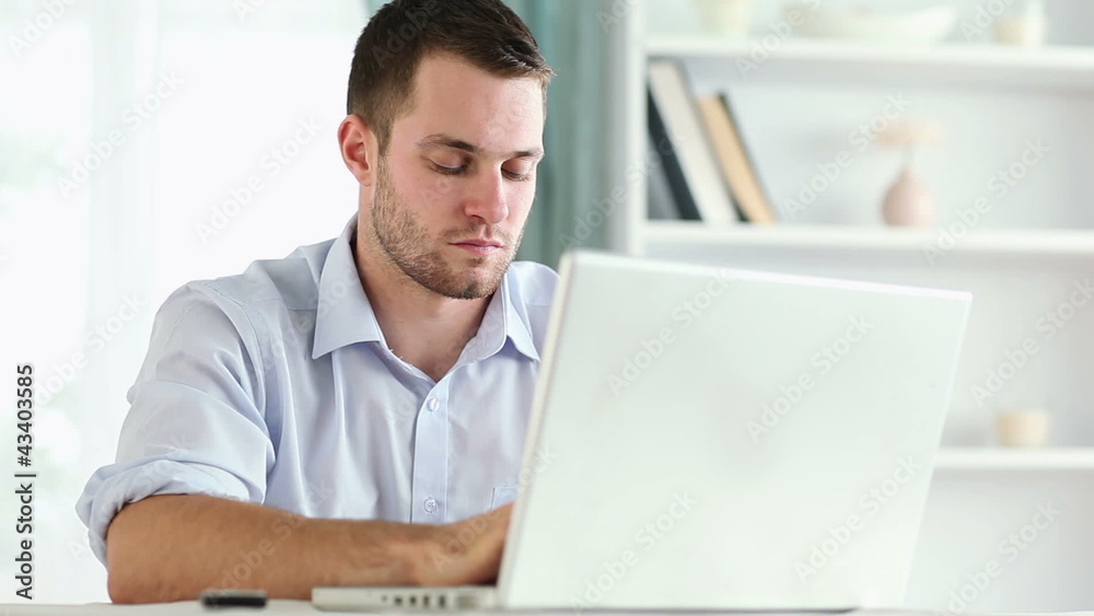 Man on call working on his laptop Man on call working on his laptop
