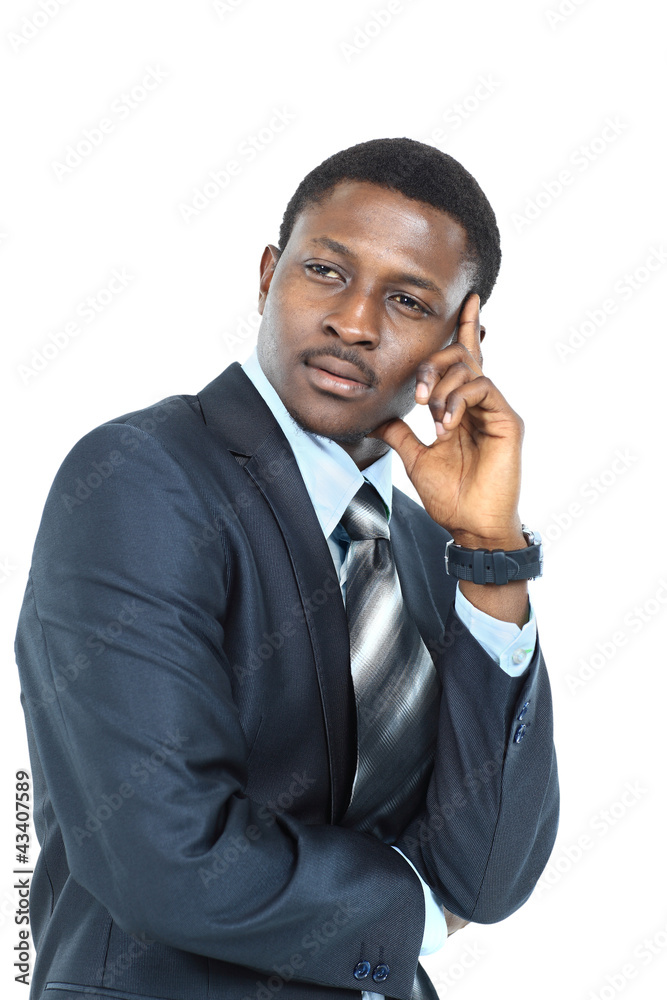 Young business man holding his head in pain Young business man holding his head in pain