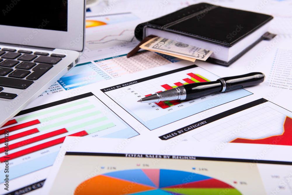 Financial papers on the table Financial papers on the table