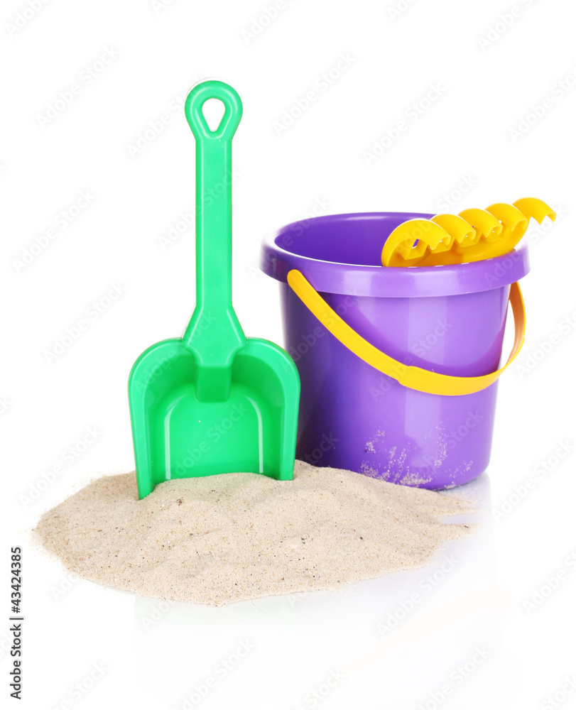 Children's beach toys and sand isolated on white Children's beach toys and sand isolated on white