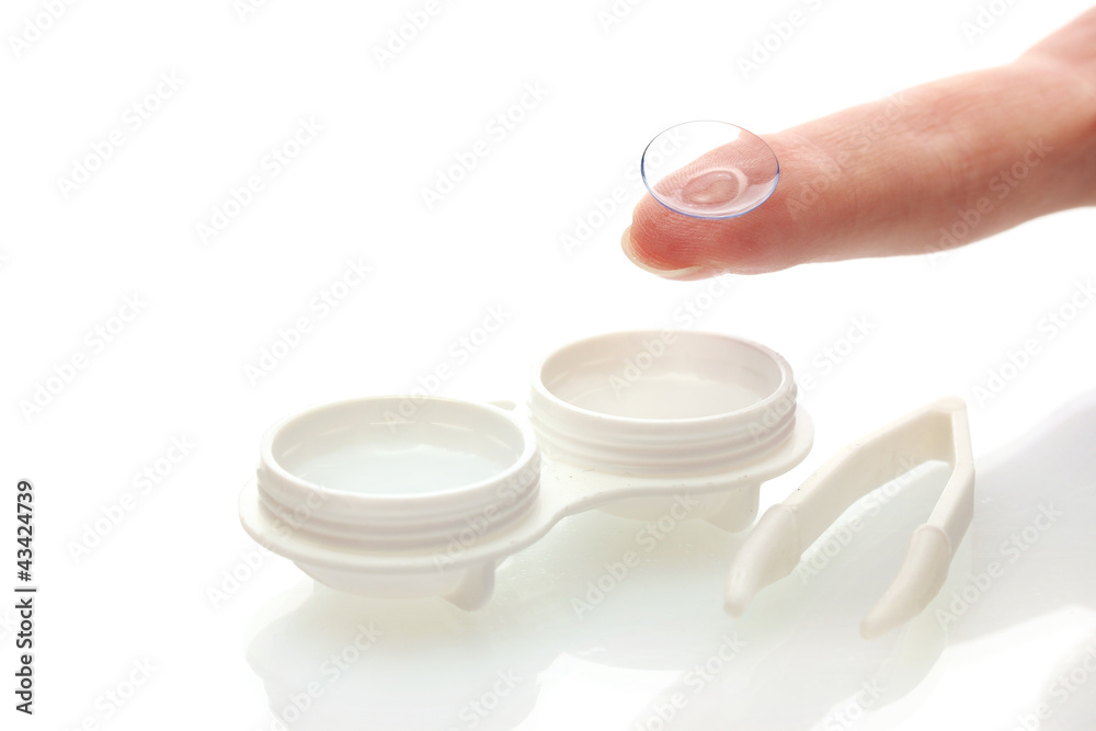 contact lenses in containers and tweezers, isolted on white contact lenses in containers and tweezers, isolted on white