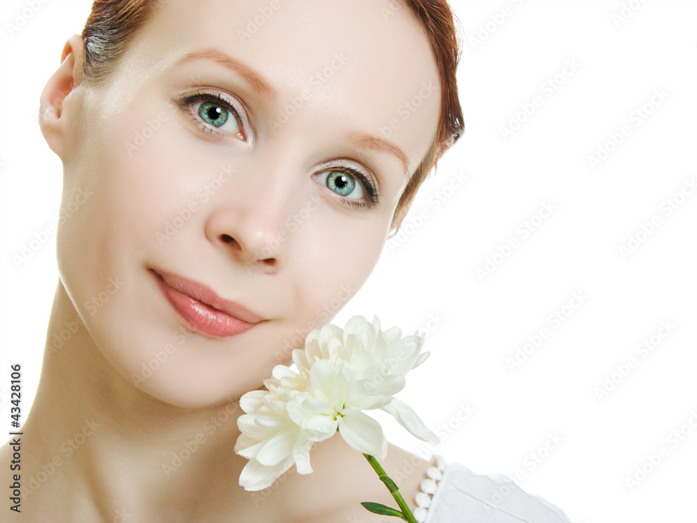Portrait of beautiful young woman with  flowers