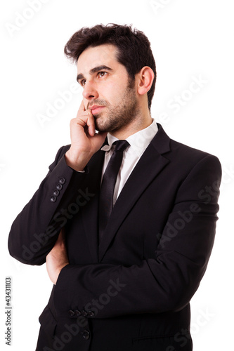 Picture of a pensive young businessman, isolated on white backg