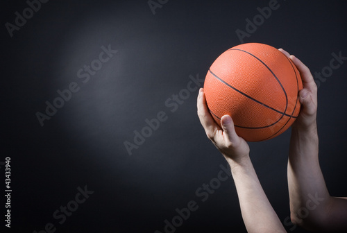 Player plays with a basketball © papa