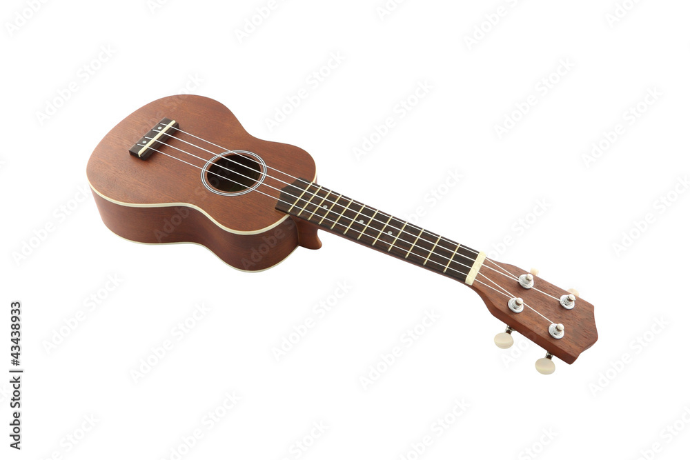 Naklejka premium Small guitar (ukulele) on white background.