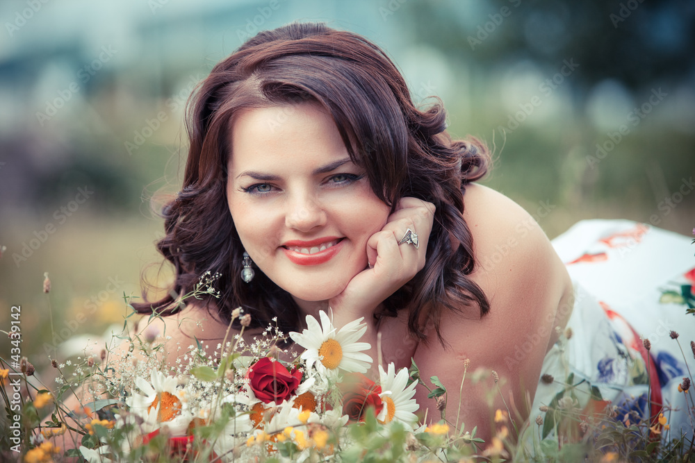 beautiful happy young woman in the park on a warm summer day beautiful happy young woman in the park on a warm summer day