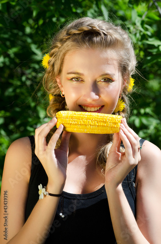 woman eating corn-cob