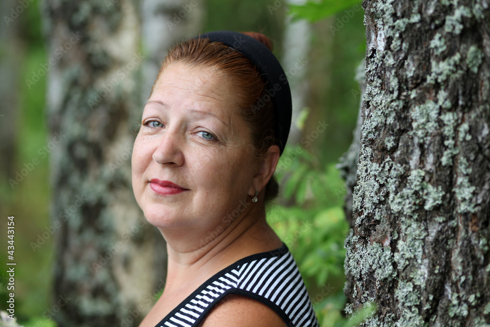Closeup portrait of a happy mature woman Closeup portrait of a happy mature woman
