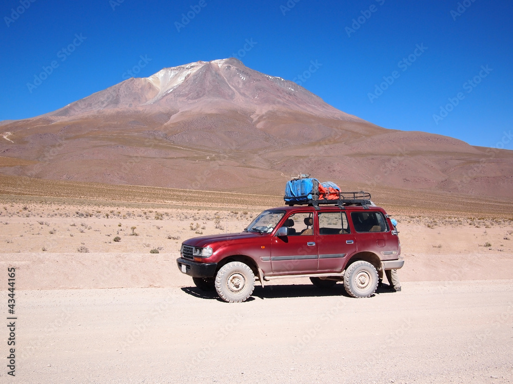 Four-wheel drive vehicle in Bolivia desert