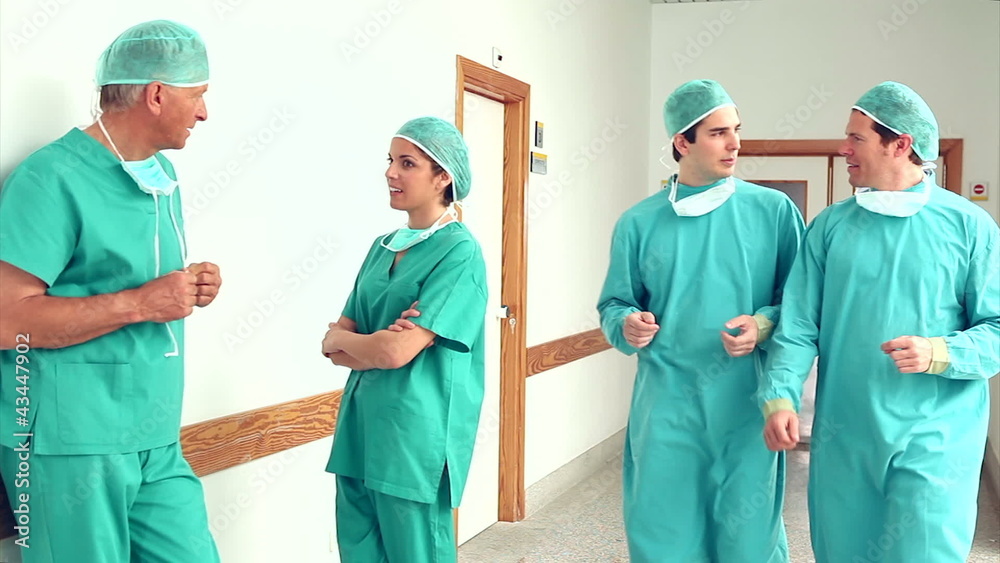 Surgeons speaking in the corridor Surgeons speaking in the corridor