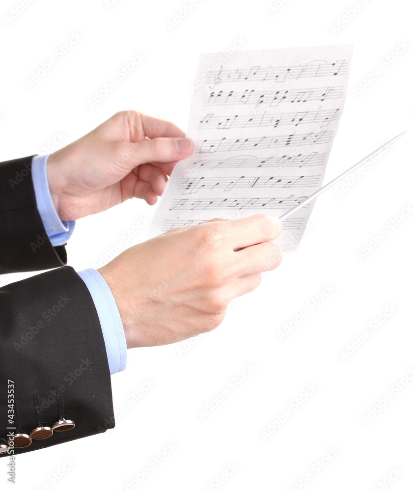Fototapeta premium Music conductor hands with baton and notes isolated on white