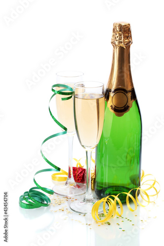 glasses and bottle of champagne, gifts and serpentine isolated
