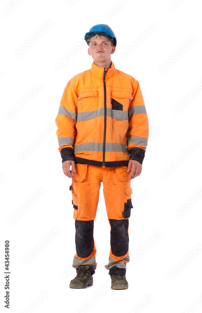 thoughtful builder in working clothes thoughtful builder in working clothes