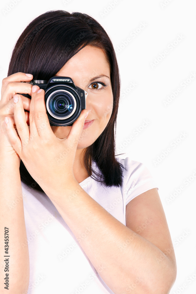 young woman holding digital camera young woman holding digital camera