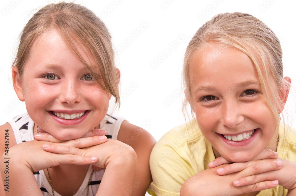 Two cute Girls smiling, isolated Two cute Girls smiling, isolated