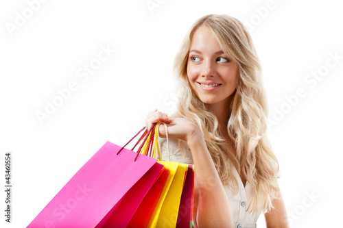 blonde woman holding shopping bags