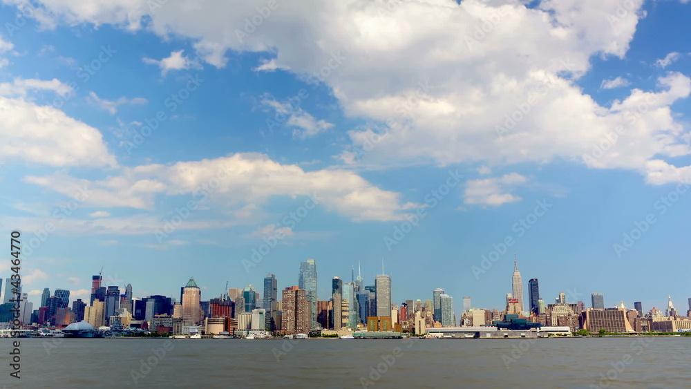 New York with Manhattan skyline over Hudson River time lapse New York with Manhattan skyline over Hudson River time lapse