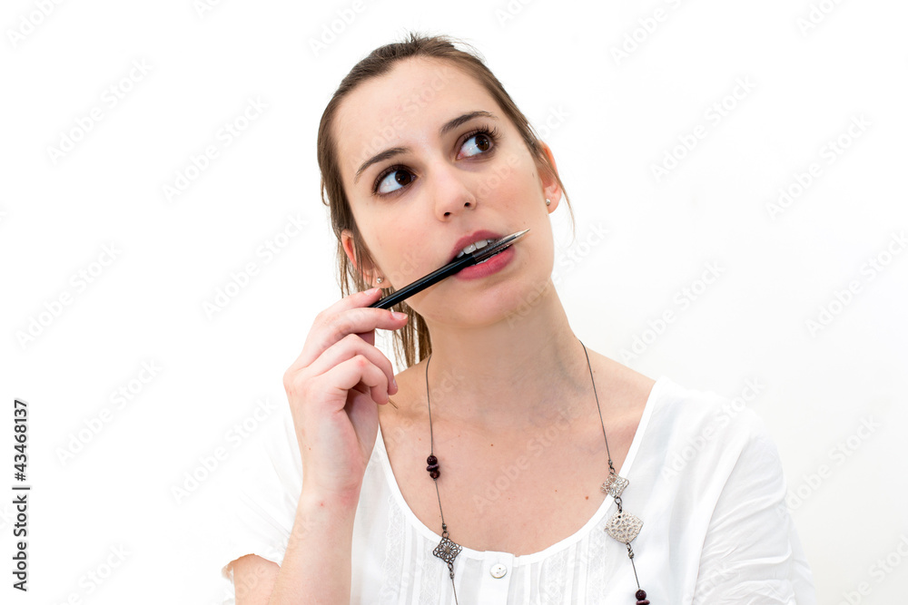 thinking or planning young woman with pen thinking or planning young woman with pen