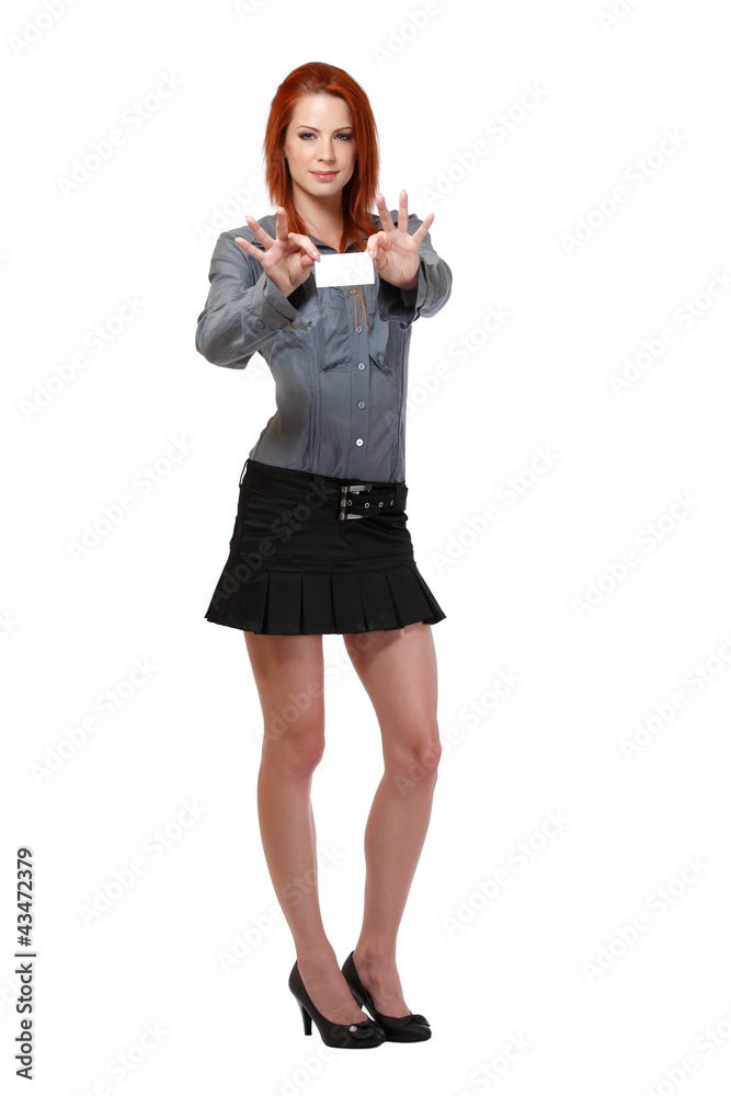 Fototapeta premium redhead woman holding a blank card