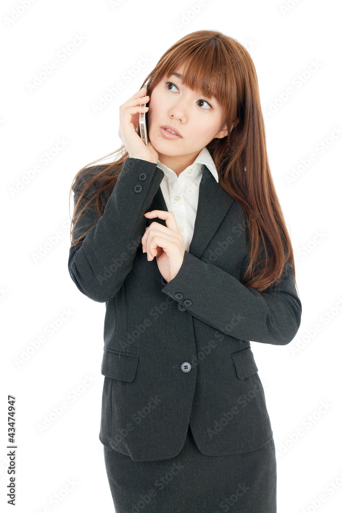 Beautiful business woman using a mobile phone. Portrait of asian