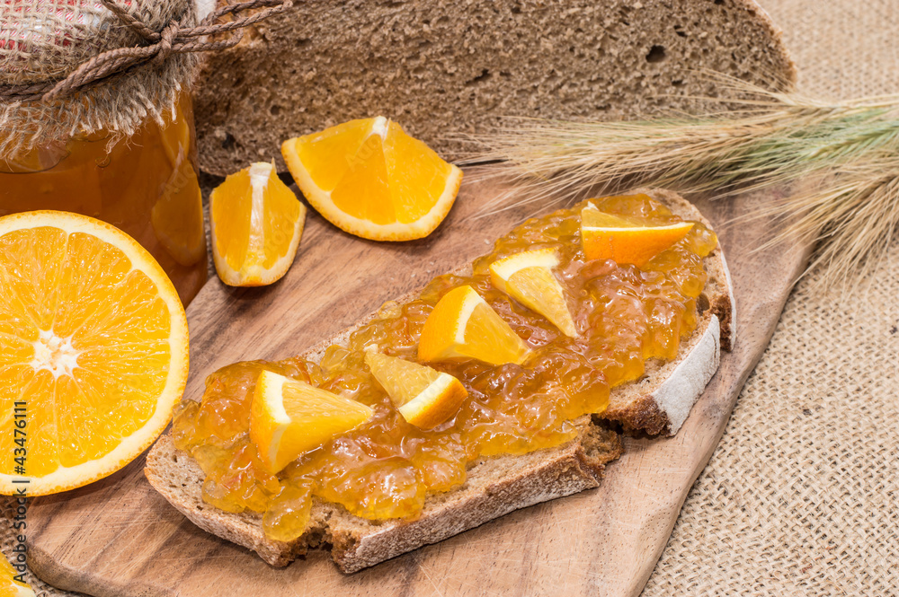 Bread with Orange Jam (rustic background)