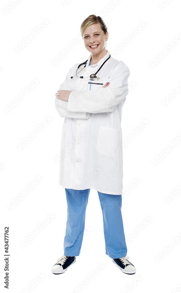 Female physician standing with crossed arms Female physician standing with crossed arms
