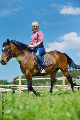 happy woman on horse