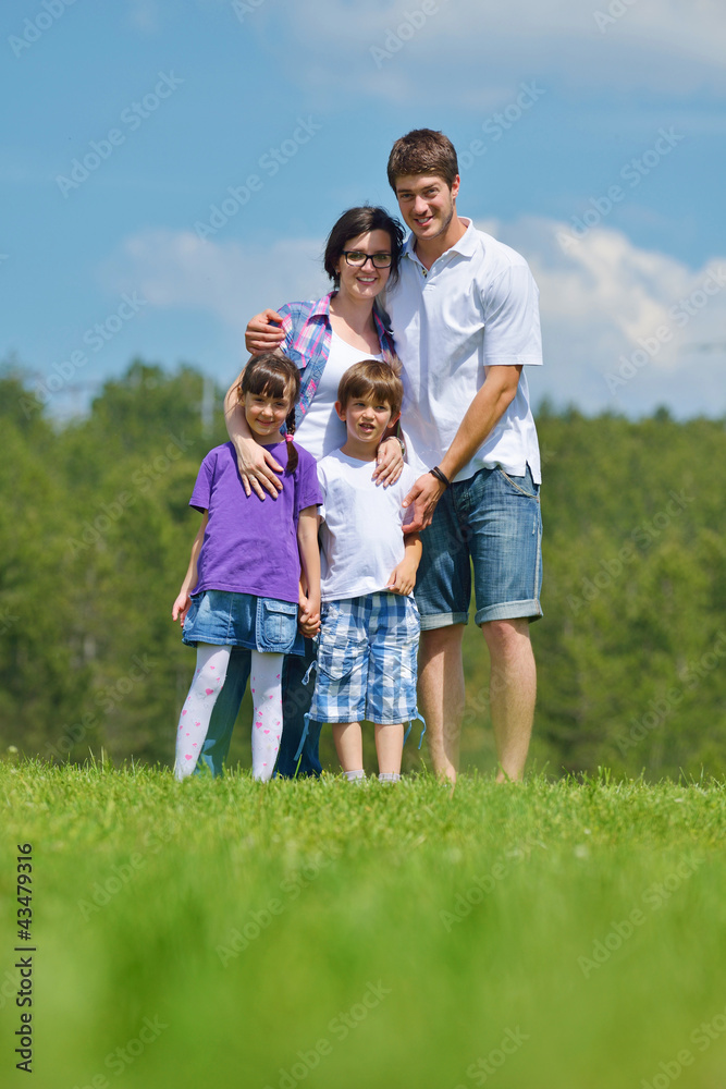 happy young family have fun outdoors happy young family have fun outdoors