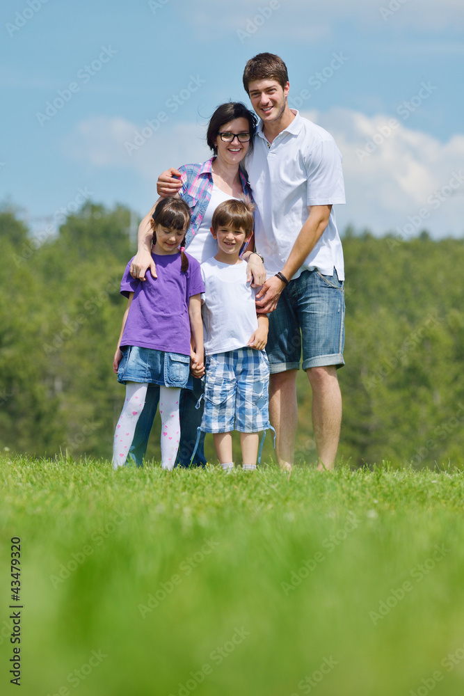 happy young family have fun outdoors happy young family have fun outdoors