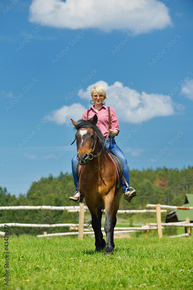 happy woman  on  horse
