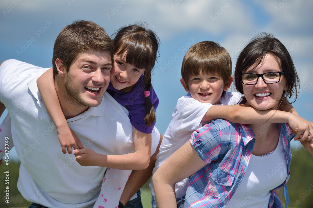 happy young family have fun outdoors happy young family have fun outdoors