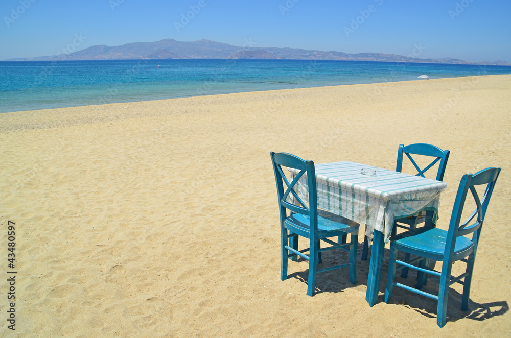 table and chairs by the sea holidays