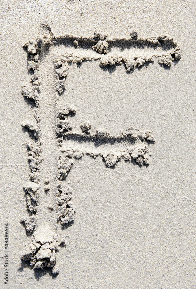 Sand beach alphabet: letter F