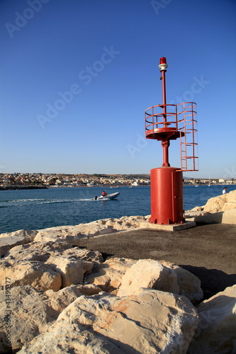 Fanale del porto di Marina di Ragusa. photo