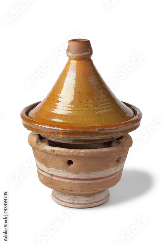 Simple traditional Moroccan tagine at a charcoal stove photo