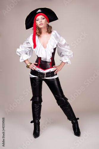 Beautiful woman in carnival costume. Pirate shape.