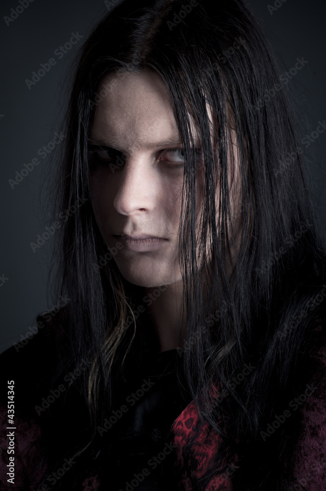 studio portrait of a man dressed as a vampire studio portrait of a man dressed as a vampire