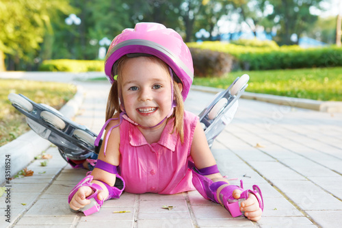 Girl wearing inline roller skates photo