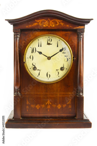 Old antique wooden clock on white photo